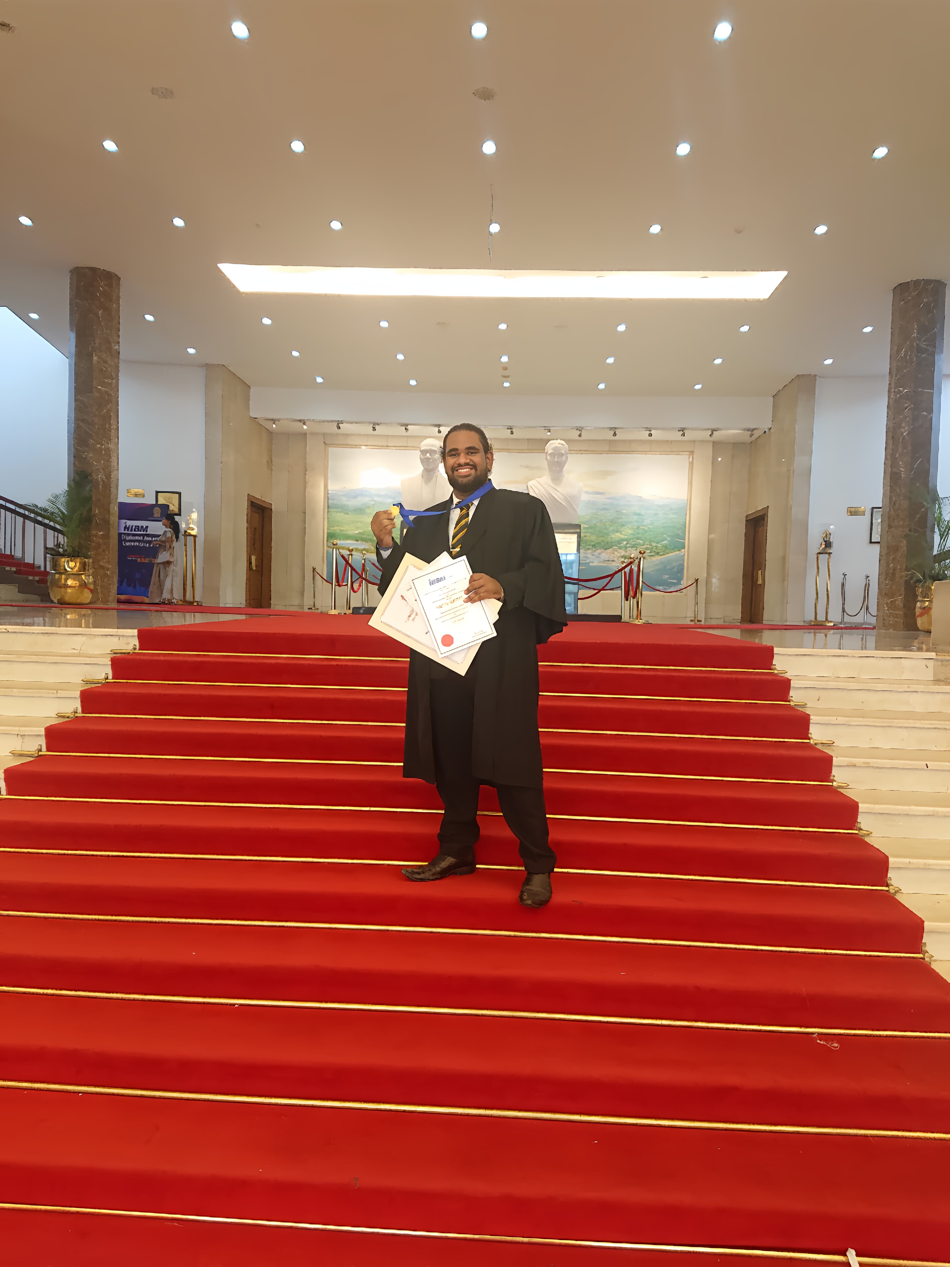 Receiving the NIBM Gold Medal at convocation